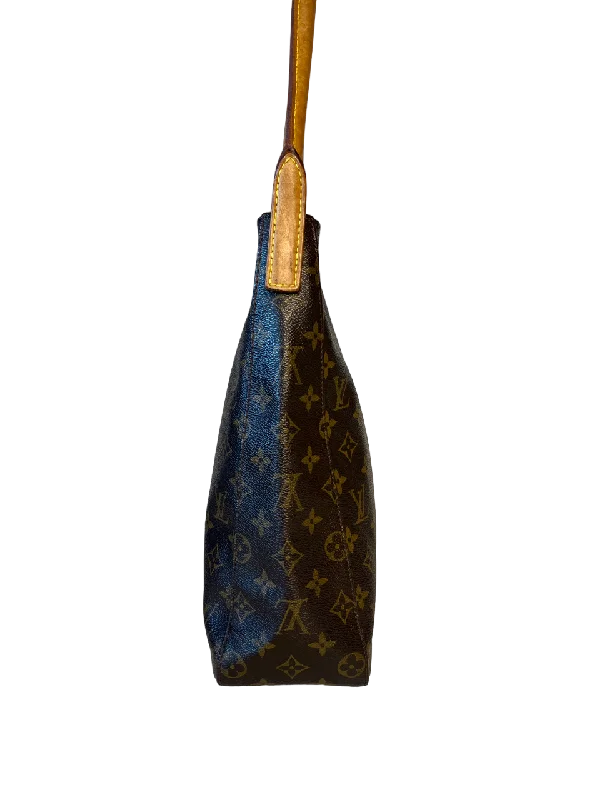 Louis Vuitton Twist bags with a contrast - colored interior for visual interestLouis Vuitton Looping Monogram