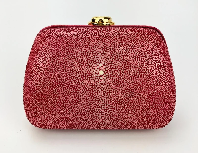 Christian Dior bags with a side - pocket for holding a water bottleCHRISTIAN DIOR Pink Galuchat Stingray Clutch