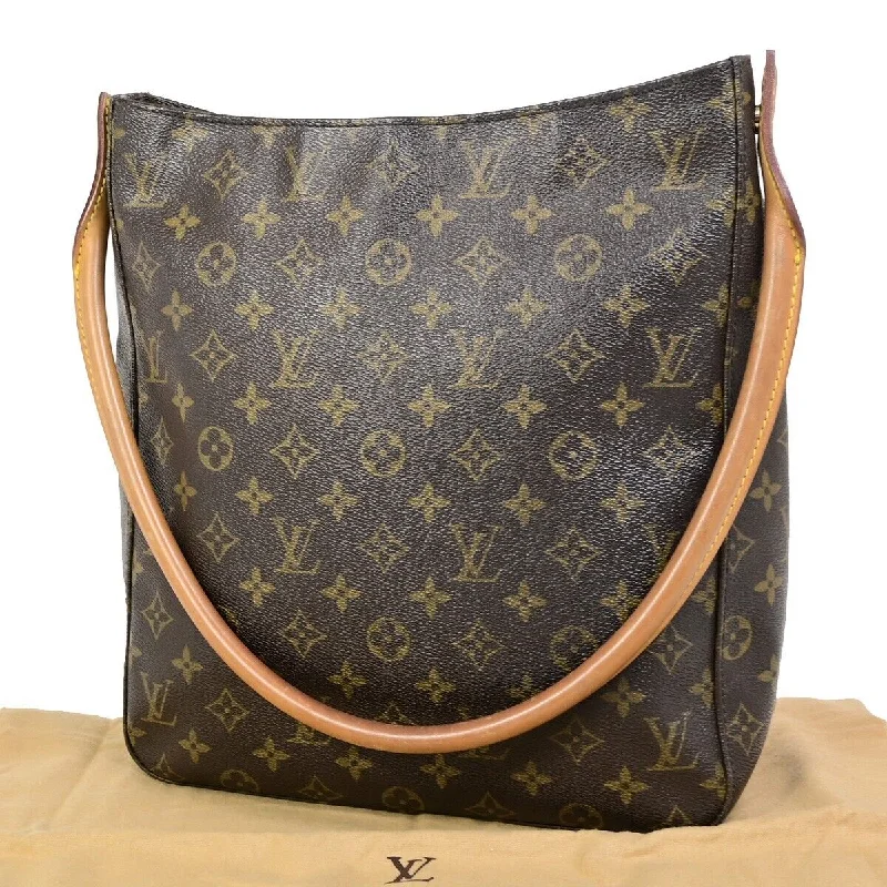 Ladies Louis Vuitton Petite Malle bags in a pastel color for a soft lookLOUIS VUITTON Looping GM Handbag