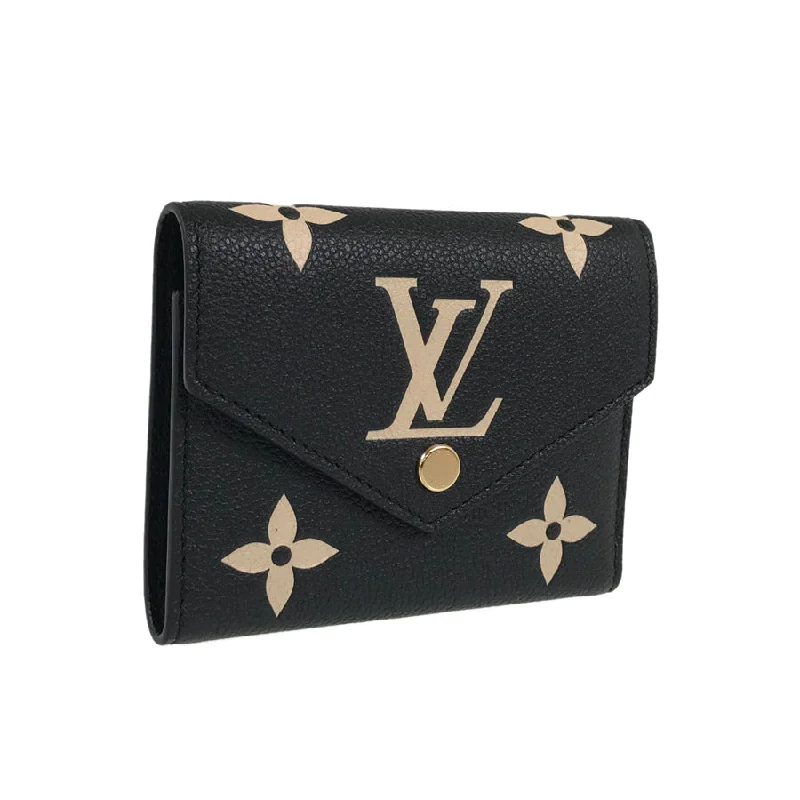 Ladies Louis Vuitton shoulder bags with a magnetic - closure flap for easeLOUIS VUITTON Monogram Empreinte Portefeiulle Victorine By color Tri-fold wallet