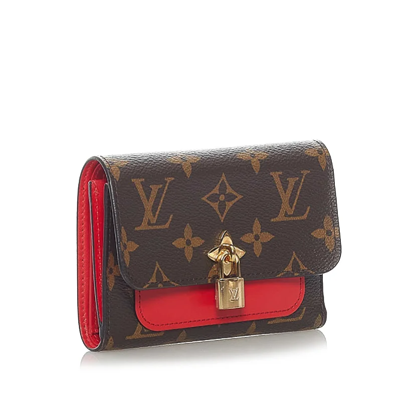 Ladies Louis Vuitton Petite Malle bags in a pastel color for a soft lookLOUIS VUITTON Louis Vuitton Monogram Flower Compact Wallet Brown