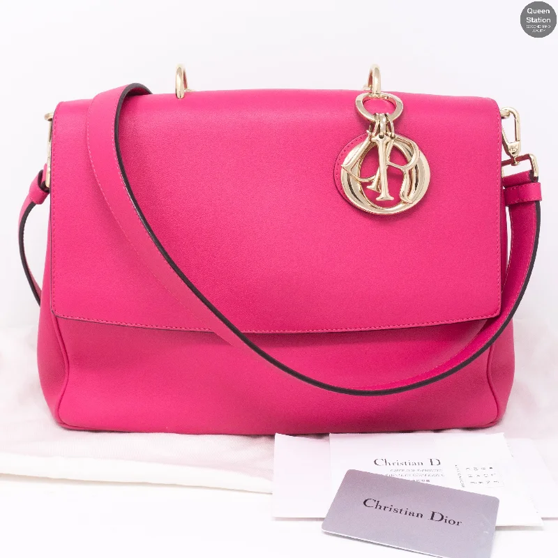 Christian Dior bags with a side - pocket for holding a water bottleBe Dior Medium Pink Leather