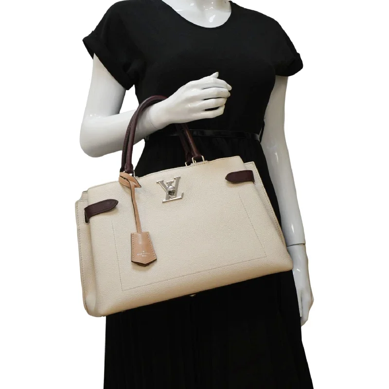 Louis Vuitton Twist bags with the iconic LV - turnlock closureLOUIS VUITTON Lockme Day Leather Shoulder Bag Creme