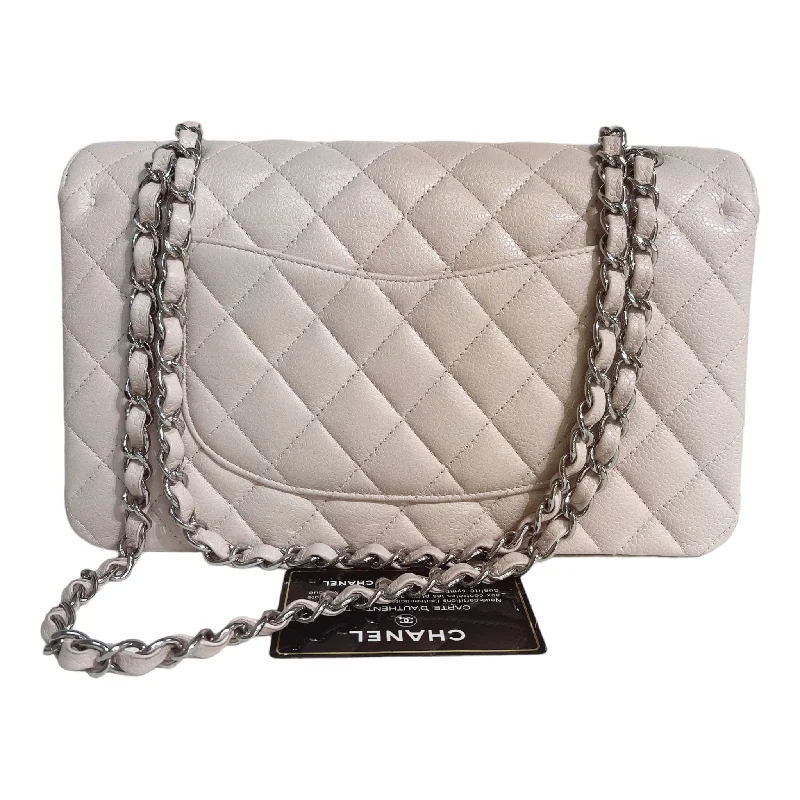 Chanel Quilted Leather Shoulder Bag for FashionistasChanel Quilted Leather Shoulder Bag for FashionistasChanel Classic M/L Medium Flap Quilted Light Pink Caviar Gold Hardware