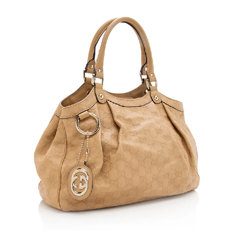 Women Gucci bags with interlocking G hardware for a classic lookGucci Guccissima Leather Sukey Medium Tote (SHF-19242)