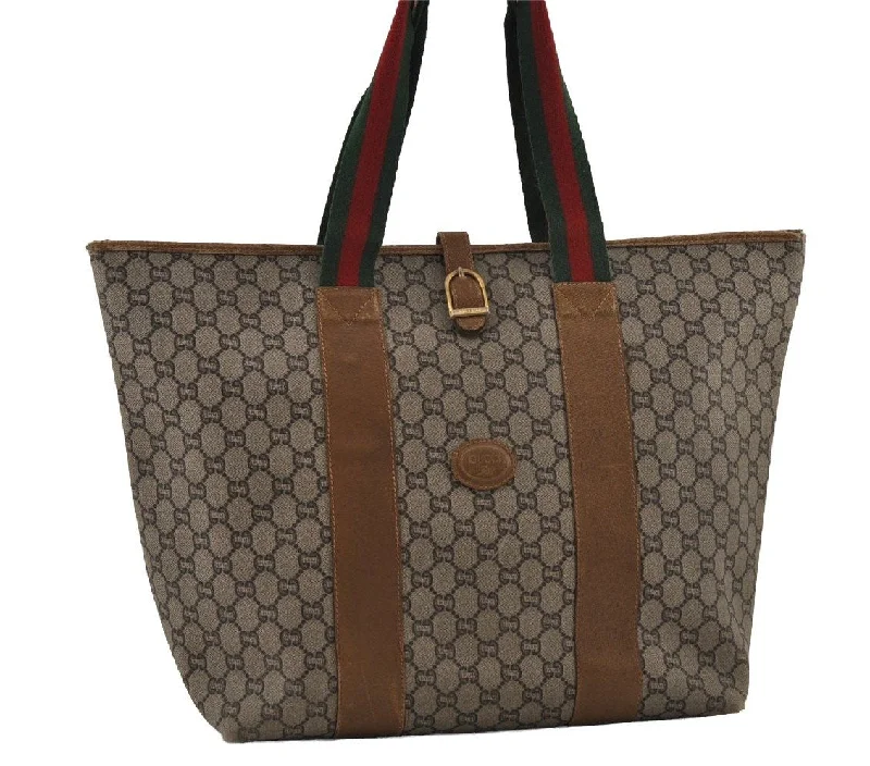 Women Gucci Sylvie bags featuring the signature web stripeAuthentic GUCCI Web Sherry Line GG Plus Tote Bag PVC Leather Brown Junk 2781I