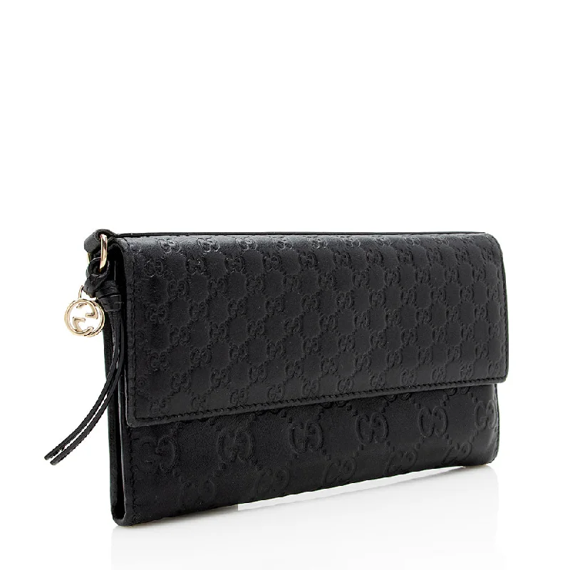 Ladies Gucci handbags with a detachable coin purse insideGucci Guccissima Metallic Leather Bree Continental Wallet (17998)