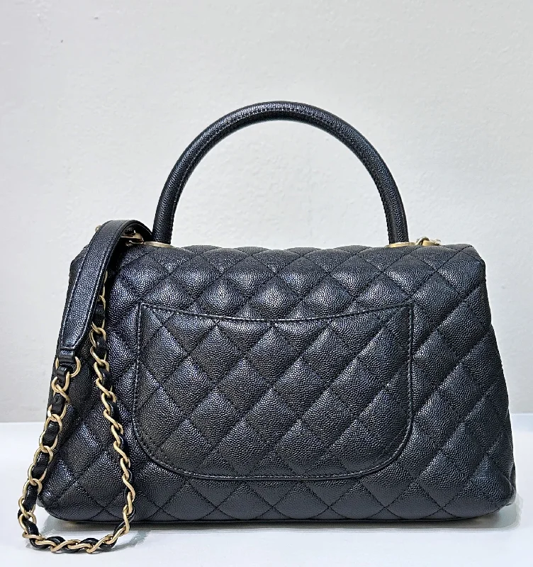 Chanel Quilted Leather Shoulder Bag for FashionistasChanel Quilted Leather Shoulder Bag for FashionistasChanel Coco Handle Cuir Matelasse Caviar Noir