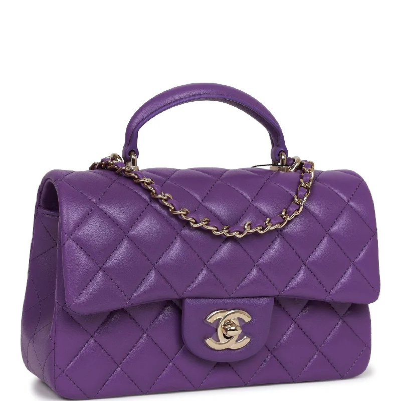 Chanel Quilted Leather Shoulder Bag for FashionistasChanel Quilted Leather Shoulder Bag for FashionistasChanel Mini Rectangular Flap with Top Handle Purple Lambskin Light Gold Hardware