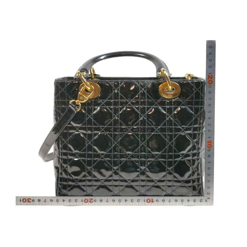 Stylish Christian Dior shoulder bags with a tassel - adorned zipperChristian Dior Black Enamel Hand Bag