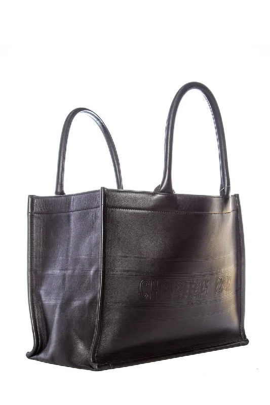 Christian Dior bags with a side - pocket for holding a water bottleChristian Dior Black Leather Embossed Logo Tote