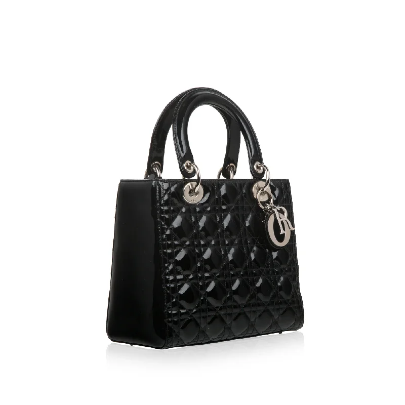 Christian Dior Saddle bags with a studded trim for a bold lookLady Dior Black Patent Leather Medium