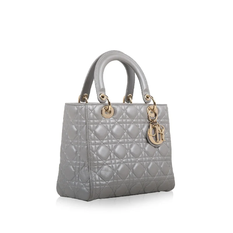 Christian Dior handbags with a snap - button closure and a decorative buckleLady Dior Medium