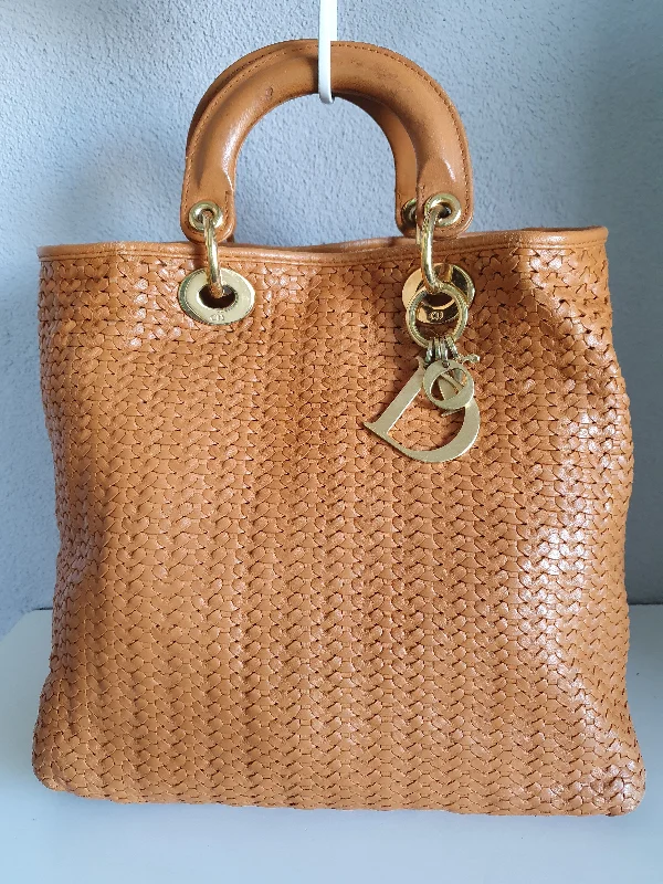 Christian Dior handbags with a back - pocket for quick storageDIOR lady dior woven handbag.