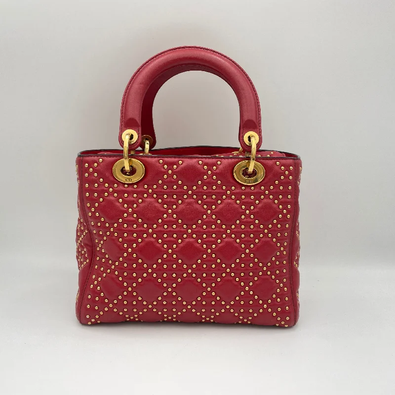 Christian Dior Saddle bags with a studded trim for a bold lookLady Dior Medium Red Top Handle Bag in Lambskin, Gold hardware